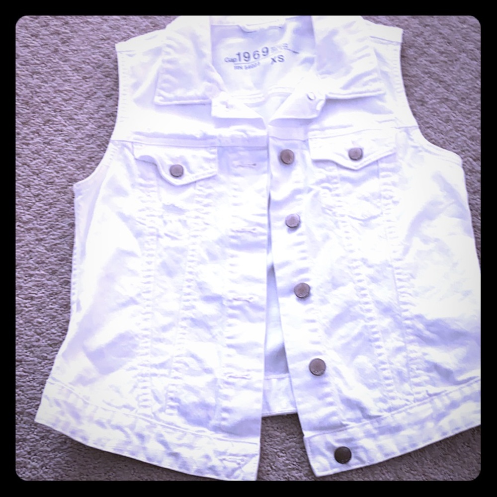 White denim vest slightly distressed